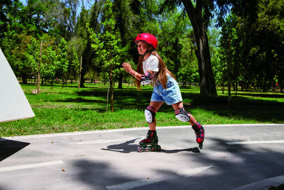 Girl rollerblading on a sunny day